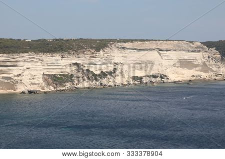White Cliffed Coast Near Bonifacio Town In Corsica Island France And The Mediterranean Sea
