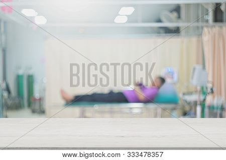 Blank Doctor Table On Bluured Interior Hospital Patient Operation For Design