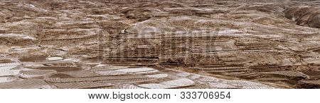 Dry Hill Barren Desert Land Rolling Landscape. A Unique Background Of Rolling Dunes And Mountain Rid