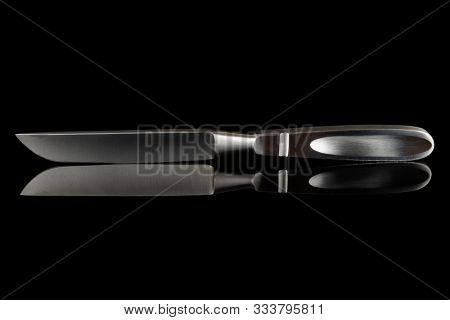 Liston amputation knife isolated on black - old sugrical instrument still used today