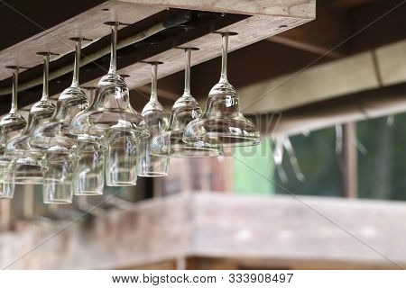 The Drink Glass Was Hung And Stored With A Glass Hanger Which Is On The Top Of The Bar.