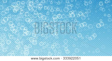 Random Soap Bubbles Abstract Background. Blowing Bubbles On Transparent Blue Background. Astonishing