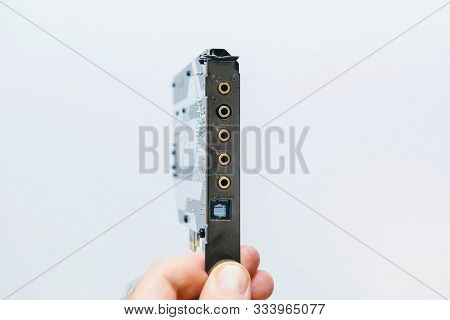 Lyon, France - Aug 9, 2019: Man Hand Holding New Creative Sound Blaster Hi-resolution Pcie Gaming So