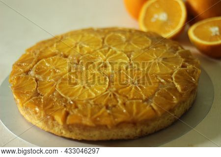 Home Baked Orange Upside Down Cake With Orange Slices On The Top