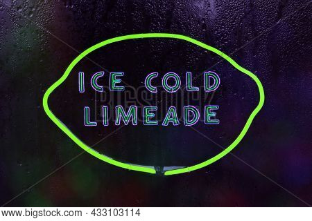 Ice Cold Limeade Sign In Rainy Window