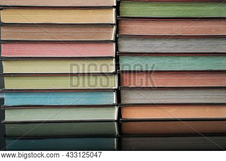 Stack Of Books With Colored Pages Close-up