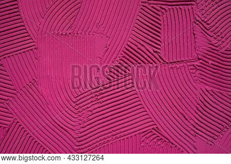 Relief Pattern Of Decorative Plaster With A Pronounced Structure Of Pink Color