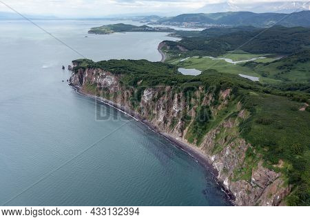 Aerial Drone Photo Of Mayachny Cape On Kamchatka Peninsula On Picturesque Avacha Bay Coast Covered B