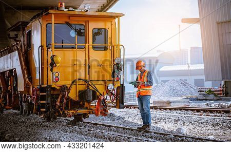 Engineer railway under  checking construction process train testing and checking railway work on rai