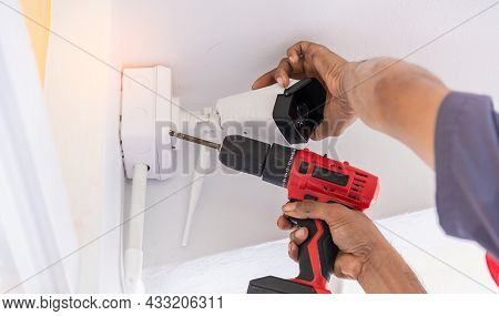Technician Installing Ip Cctv Camera And Water Proof Box To Protect Camera Is Home Security System C