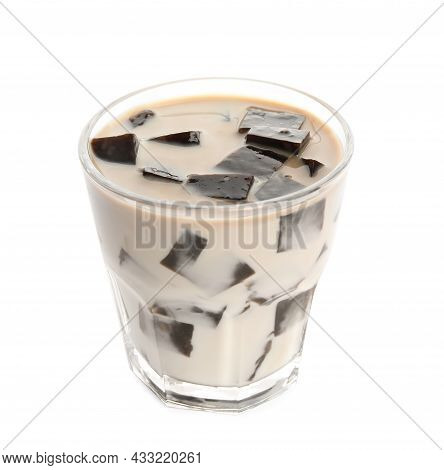 Glass Of Milk With Grass Jelly Isolated On White