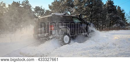 One Suv 4x4 Cars Go On Snowy Road, Winter Season, Very Cold, Istanbul Turkey, January 1, 2016