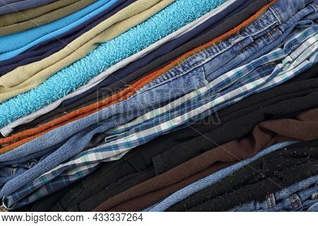 Clothes And Accessories - Diagonal Closeup Group Stack Pile Clotes Background