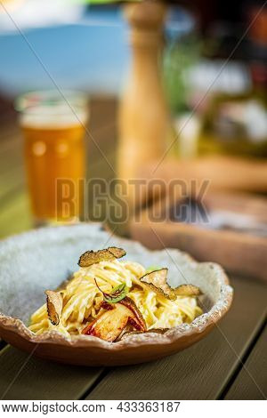 Fancy organic fetuccine pasta with creamy alfredo mushroom sauce