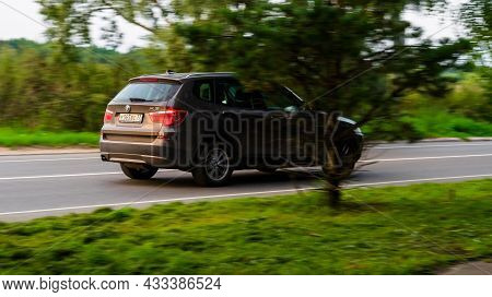 Moscow, Russia - August 2021: Bmw X3 Rides On Country Road. Overspeed Out Of City Concept. White Suv