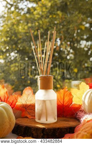 Autumn Scent. Bamboo Sticks Diffuser. Fragrant Air Freshener Liquid In Glass Vial With Falling Leave