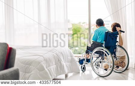 Portrait Of Enjoy Happy Love Family Asian Mother Playing And Carer Helping Look At Disabled Son Chil