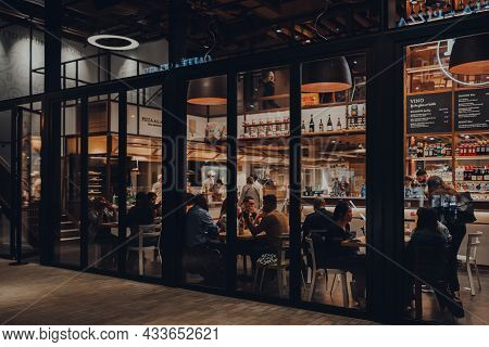 London, Uk - September 03, 2021: View From Outside Of People Sitting Inside Eataly, A 42,000 Square 