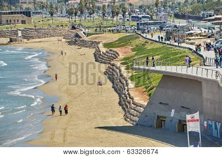 People On The Mediterranean  Beach