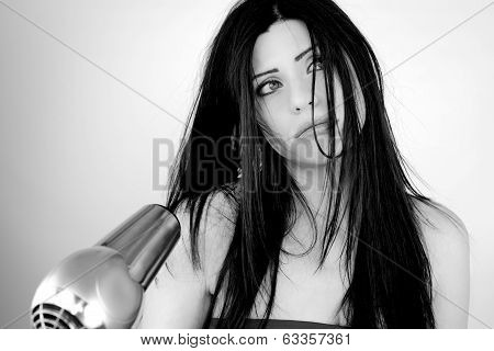 Beautiful Woman Tired Of Drying Long Hair