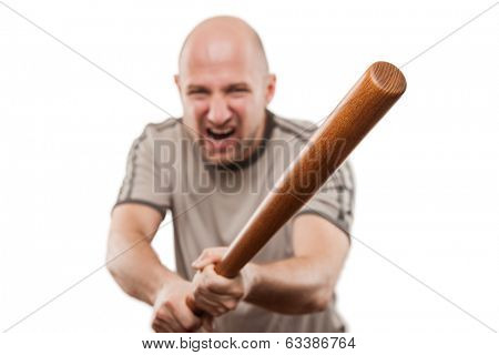 Violence and aggression concept - furious screaming angry man hand holding baseball sport bat 
