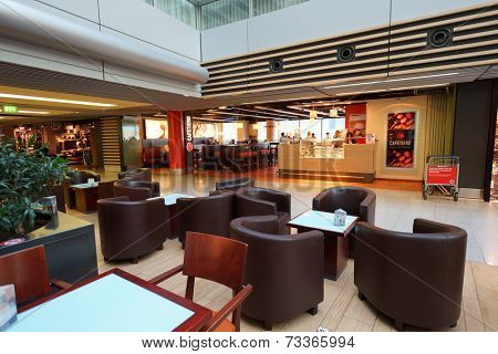 DUSSELDORF - SEPTEMBER 16: airport cafe interior on September 16, 2014 in Dusseldorf, Germany. International airport of Dusseldorf located approximately 7 kilometres north of downtown Dusseldorf