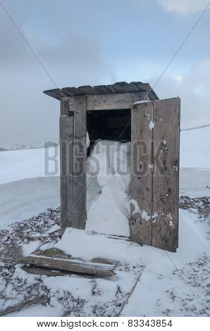 Wooden toilet box  of snow on the alps