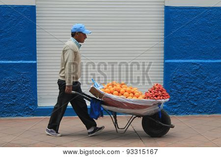 Fruit Vendor On A Street In Cuenca, Ecuador