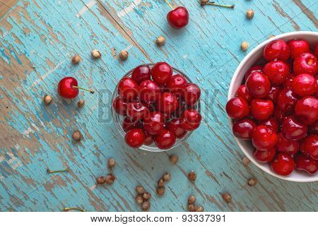Sweet Cherry In Bowl On Rustic Table