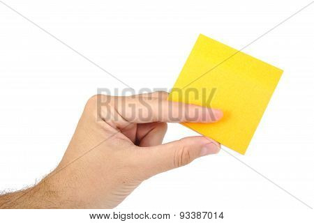 Man hand holding tellow sticky note isolated on a white background