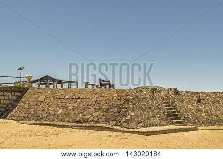 Stone construction viewpoint at the beach in the coast of Maldonado Uruguay