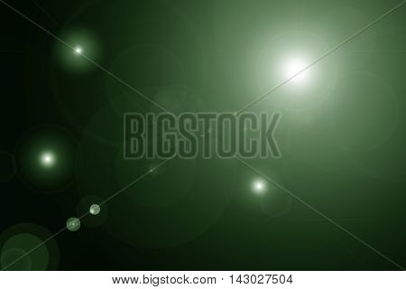 Digital lens flare in black background horizontal frame green abstract background