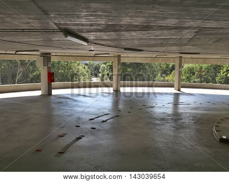 Parking garage underneath the hospital heliport .