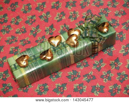 Very luxury wrapping gift with gold hearts