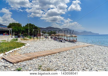 PALEOCHORA, CRETE, GREECE - JUNE 2016: Road to stone beach of Paleochora town on Crete island.