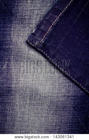 closeup detail of blue denim jeans trouses texture background