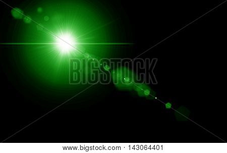 Digital lens green flare in black background horizontal frame warm and abstract background