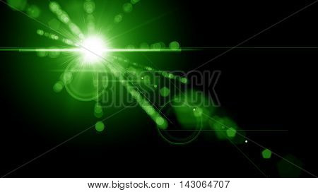 Digital lens green flare in black background horizontal frame warm and abstract background