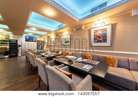 MOSCOW - JULY 2014: Interior of stylish Mediterranean cuisine Italian restaurant - 