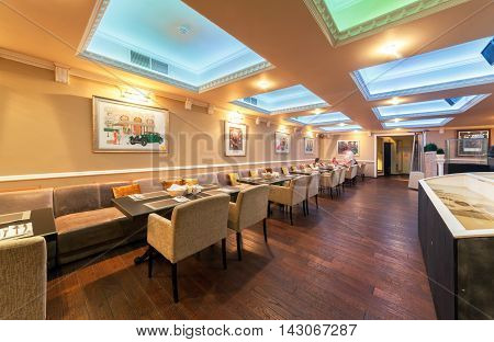 MOSCOW - JULY 2014: Interior of stylish Mediterranean cuisine Italian restaurant - 