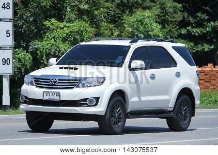 CHIANGMAI THAILAND -JULY 27 2016: Private car Toyota Fortuner. Suv for Urban User. On road no.1001 8 km from Chiangmai Business Area.
