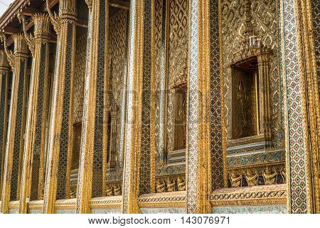 BANGKOK THAILAND - MARCH 9 2016: The beautiful terrace of main temple of Wat Phra Kaew the most sacred Buddhist temple and the most famous tourist attraction in Bangkok Thailand.