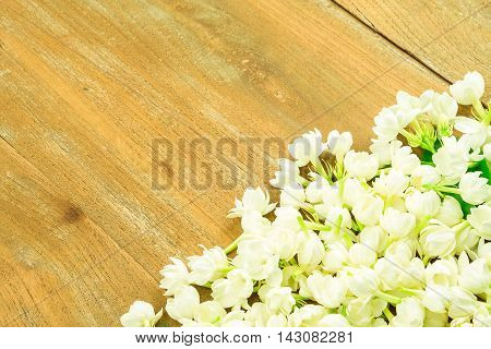 jasmine on wood table background with good smell