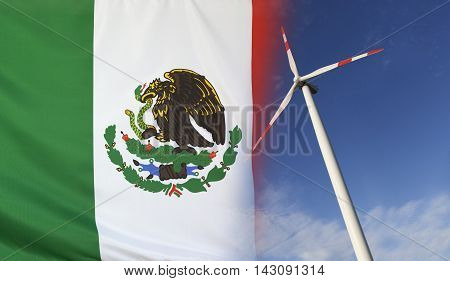 Concept clean energy with flag of Mexico merged with wind turbine in a blue sunny sky
