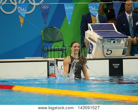RIO DE JANEIRO, BRAZIL - AUGUST 8, 2016: Katinka Hosszu of Hungary celebrates winning gold in the Women's 100m backstroke Final of the Rio 2016 Olympic Games at the Olympic Aquatics Stadium