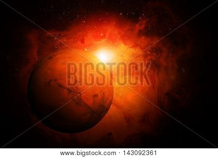 Solar System - Mars. It is the fourth planet from the Sun. Mars is a terrestrial planet with a thin atmosphere having craters volcanoes valleys deserts. Elements of this image furnished by NASA