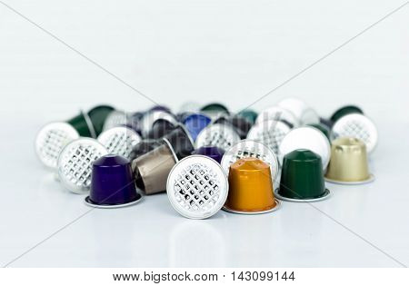 Group of Single-serve coffee capsules isolated on white background