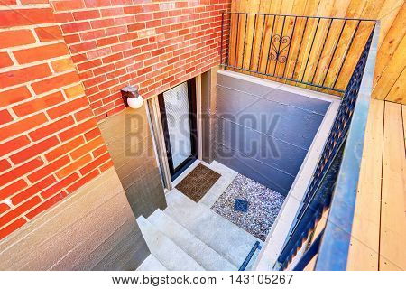 Exterior Steps Lead To Underground Basement Of The Brick House