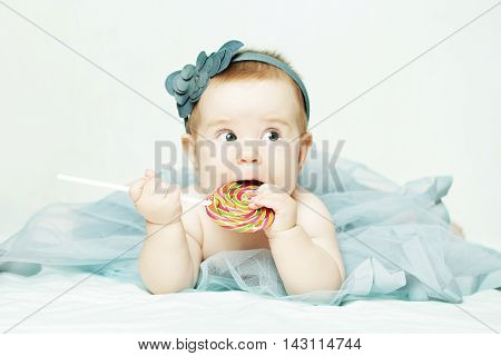 Cute baby girl birthday concept on gray