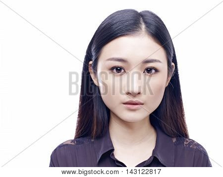 passport photo of a young and beautiful asian girl isolated on white background.